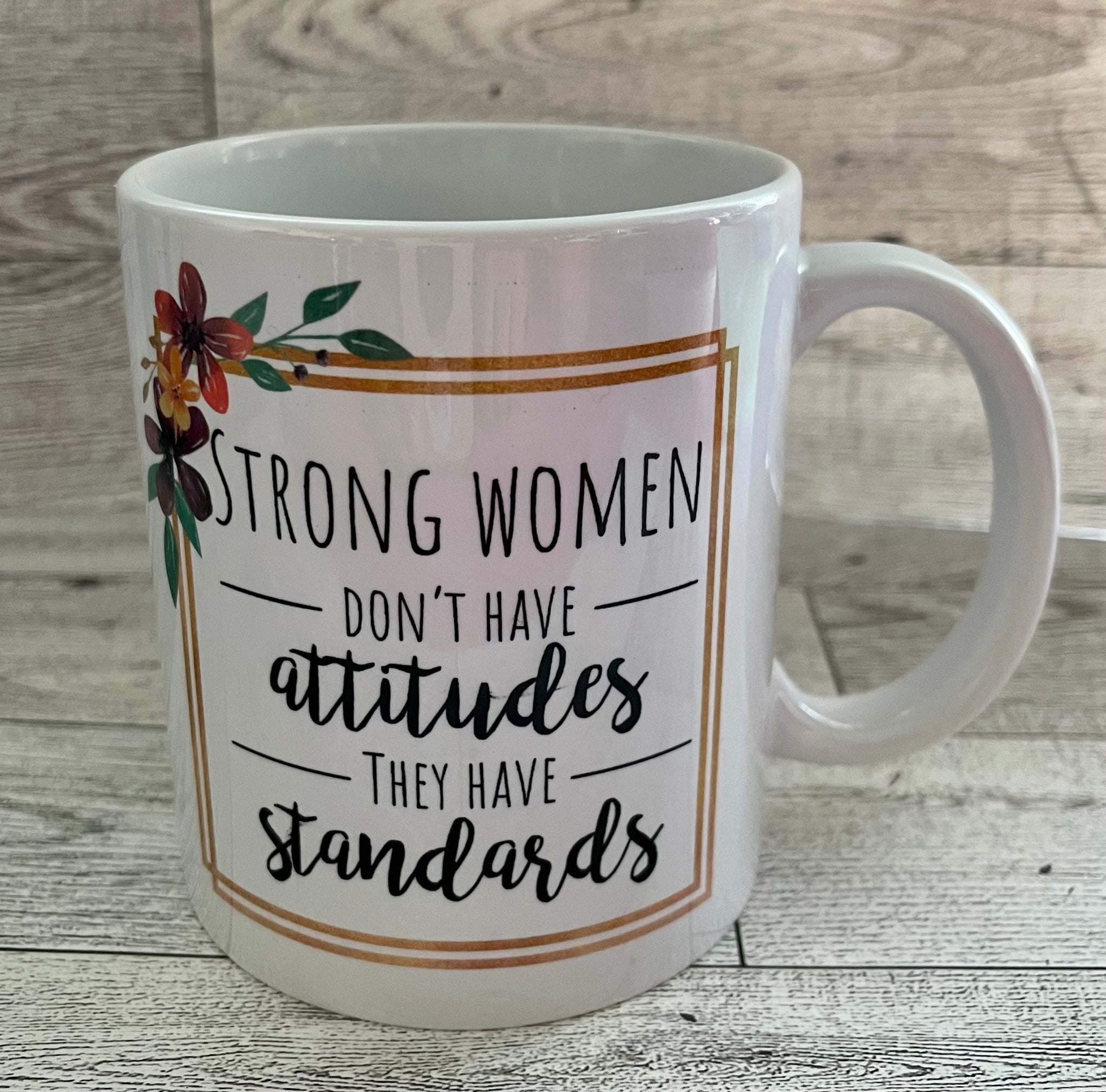 Strong women don’t have attitude they have standards coffee mug